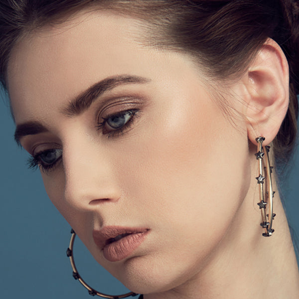 AMMANII Large Hoop Earrings with Bezel Studded Stars in Vermeil Gold - AMMANII