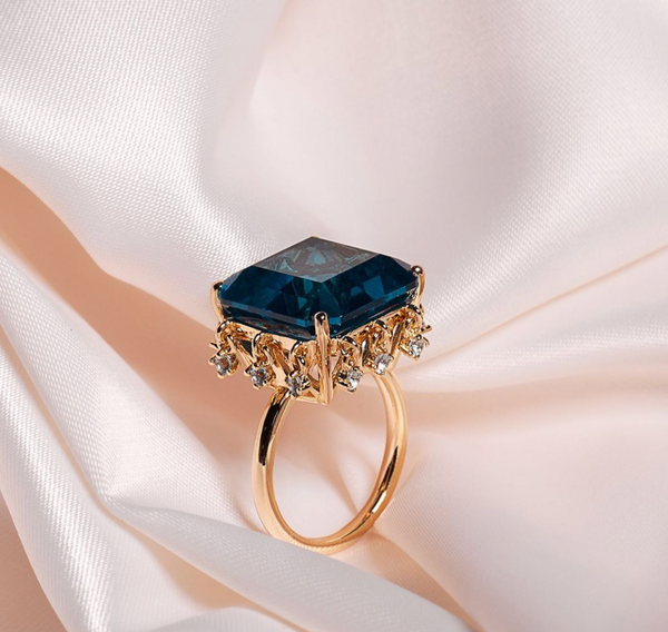 AMMANII Blue Topaz Queen's Crown Ring with Charms in Vermeil Gold - AMMANII