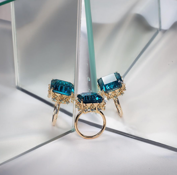 AMMANII Blue Topaz Queen's Crown Ring with Charms in Vermeil Gold - AMMANII